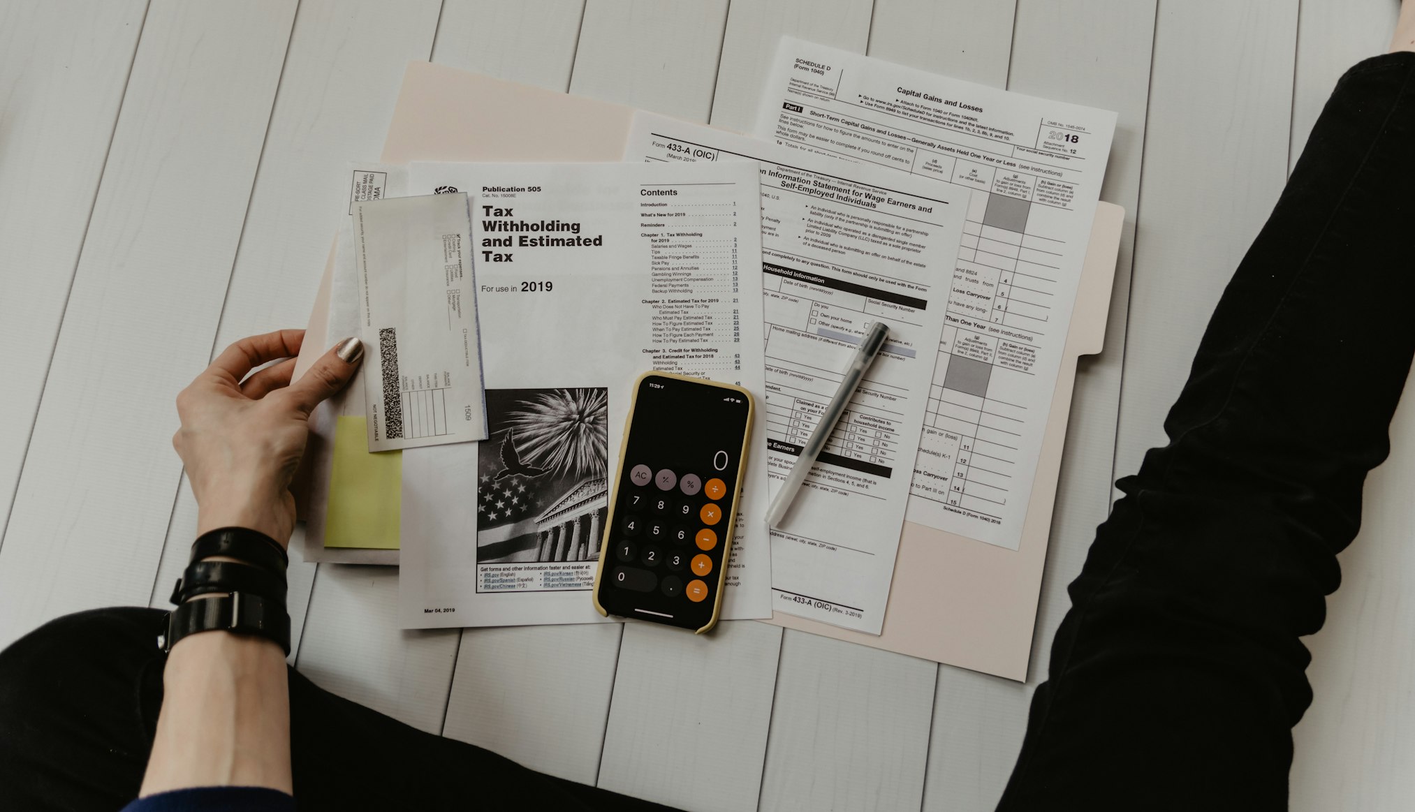 Professional accounting workspace with organized documents and charts